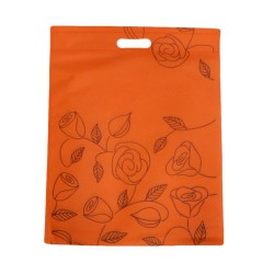 12 poches non-tissées de couleur orange imprimé de roses 25x33cm