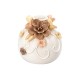 Petit vase boule en céramique blanc avec fleurs en relief