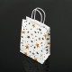 12 petits sacs en papier kraft blanc décor étoiles 15x21x8cm - 7391