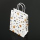12 sacs papier kraft lisse blanc décor étoiles 18.5x9.5x25.5cm - 7392