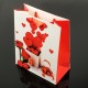 Lot de 12 sacs cadeaux motifs Saint-Valentin couleur rouge et blanc 26.5x10x33cm - 7660