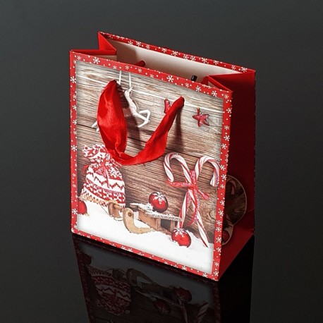 Lot de 12 sacs cadeaux de Noël rouges décor traineau et sucre d'orge 17.5x8.5x24cm - 9121