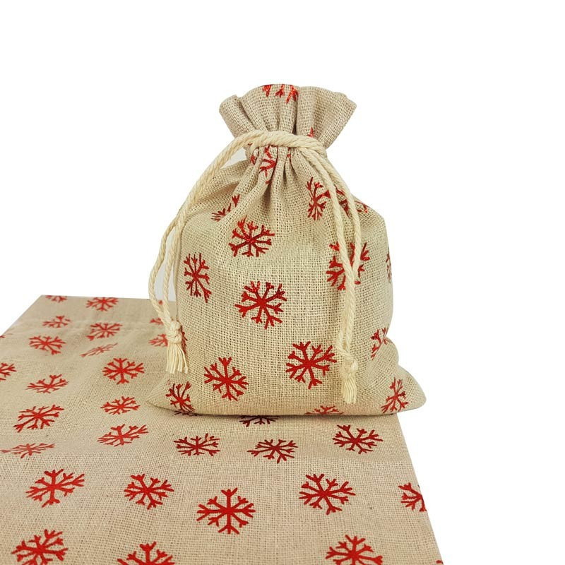 10 bolsas de algodón beige con motivo de copos de nieve rojos brillantes, 6,5 x 8,5 cm