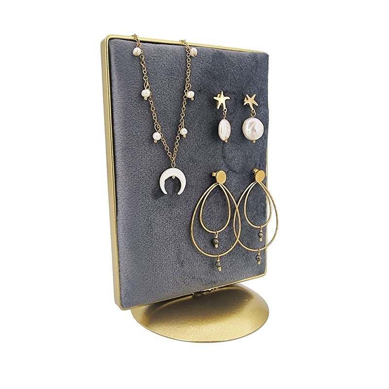 Petit porte bijoux en suédine suédine gris anthracite sur socle en métal doré