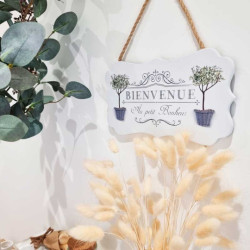 Cartel decorativo «Bienvenue» con aspecto de madera blanca