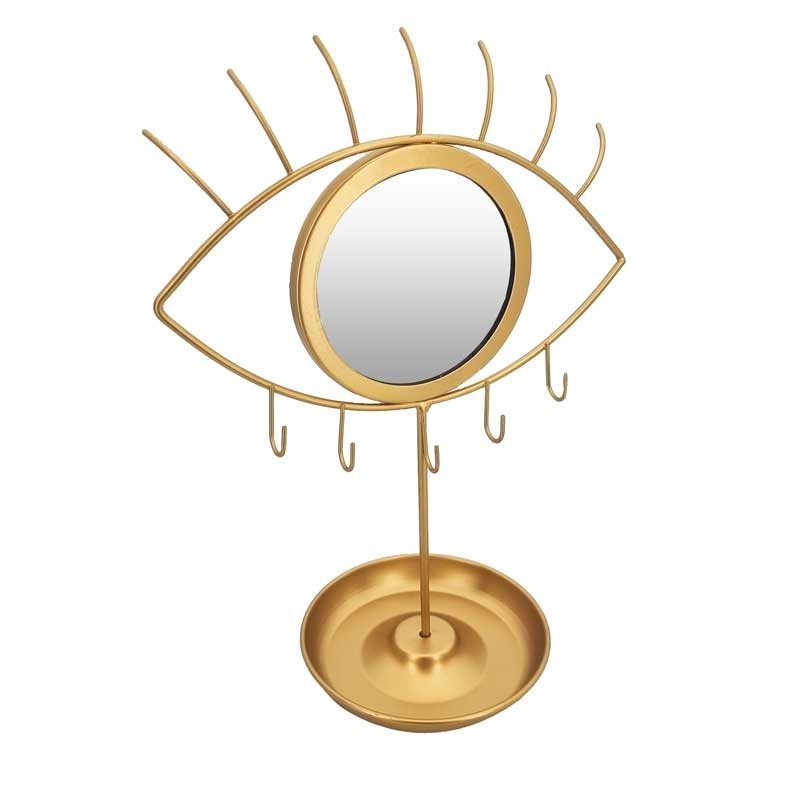 Joyero con espejo de metal dorado con forma de ojo