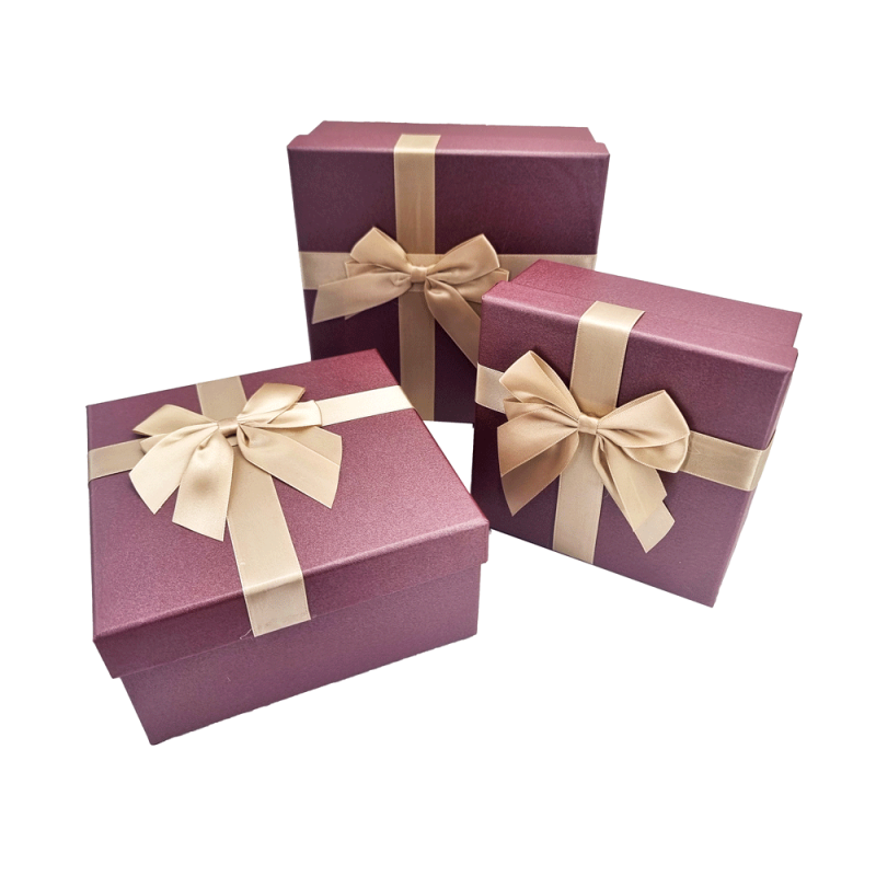 Caja de regalo grande y elegante en color morado iridiscente con lazo de raso dorado