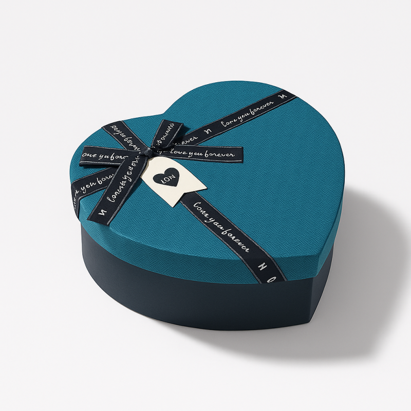 Caja de regalo con forma de corazón azul verdoso con lazo, 15 x 18 x 7,5 cm