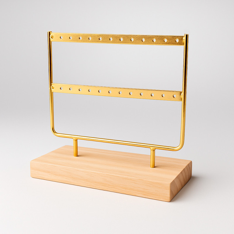 Pequeño joyero de metal dorado sobre base de madera para 12 pares de pendientes