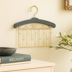 Perchero decorativo de pared para joyas de metal dorado y terciopelo gris ratón
