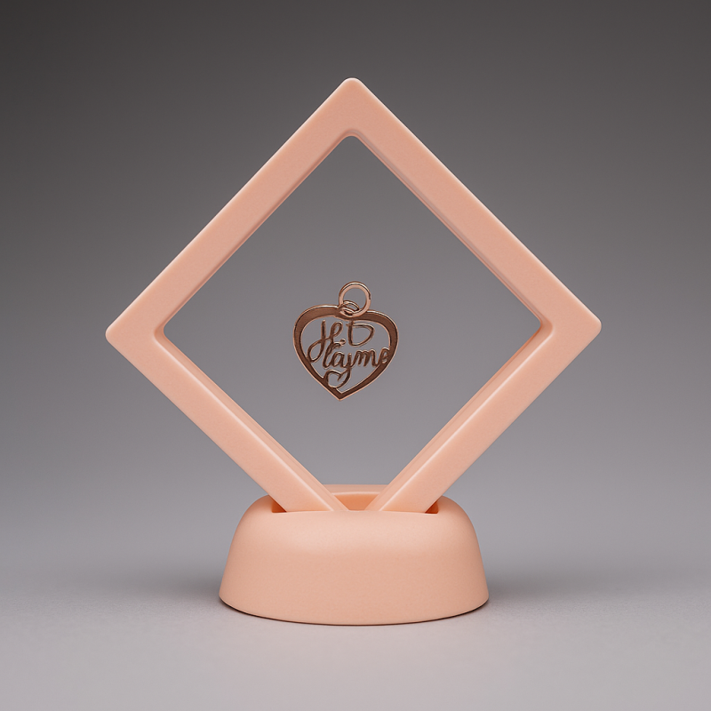 Pequeño expositor flotante para joyas de 7 x 7 cm en forma de rombo - rosa pastel