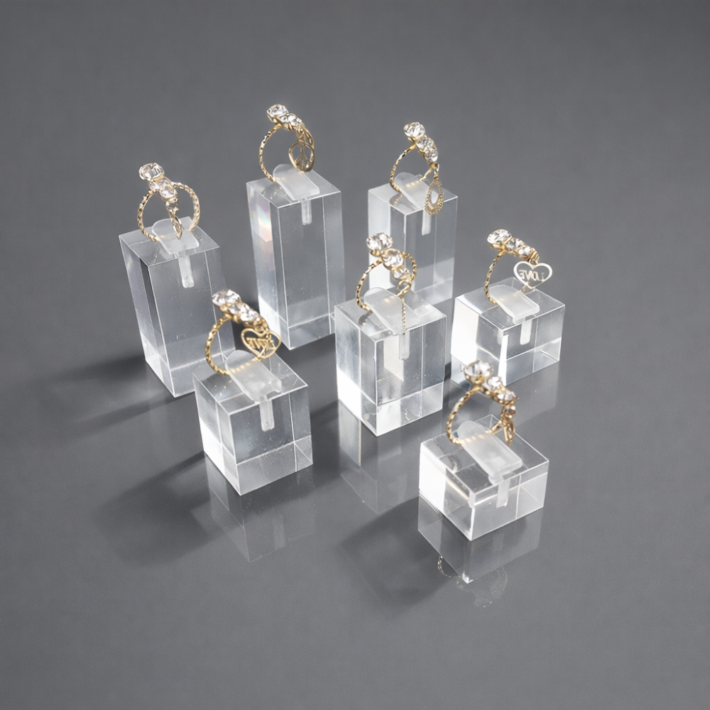 Set de 7 soportes para anillos de metacrilato transparente