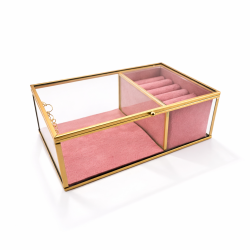 Caja para anillos de metal dorado y vidrio con fondo de ante rosa