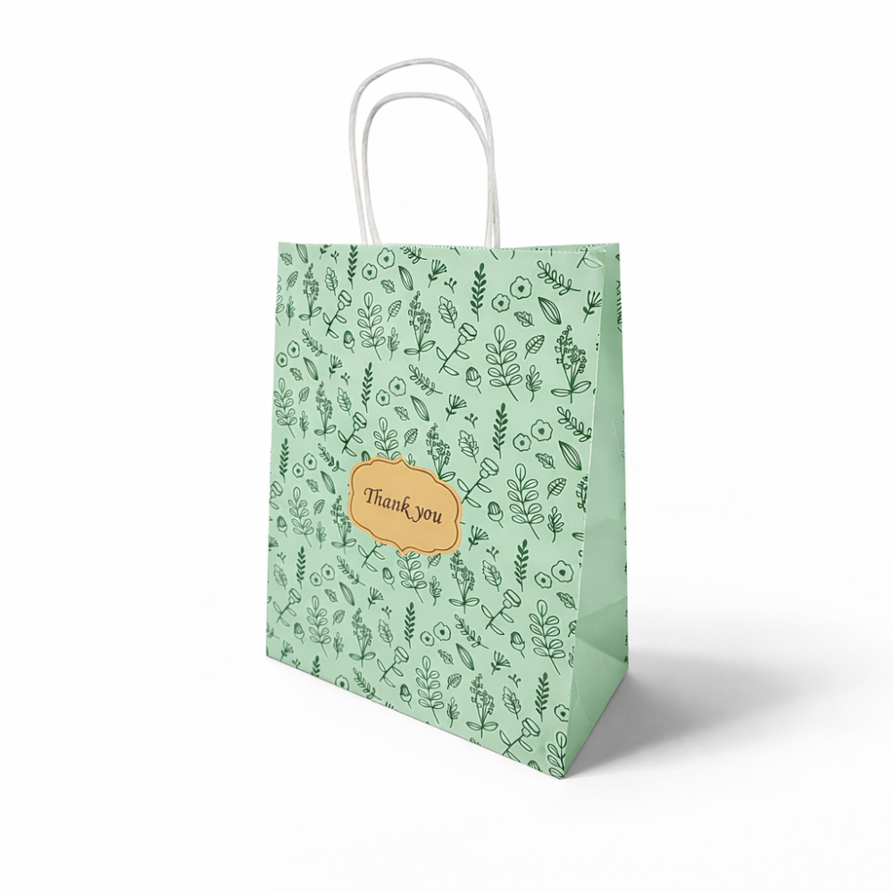 12 bolsas de papel kraft con flores negras sobre fondo verde almendra 21 x 11 x 27 cm
