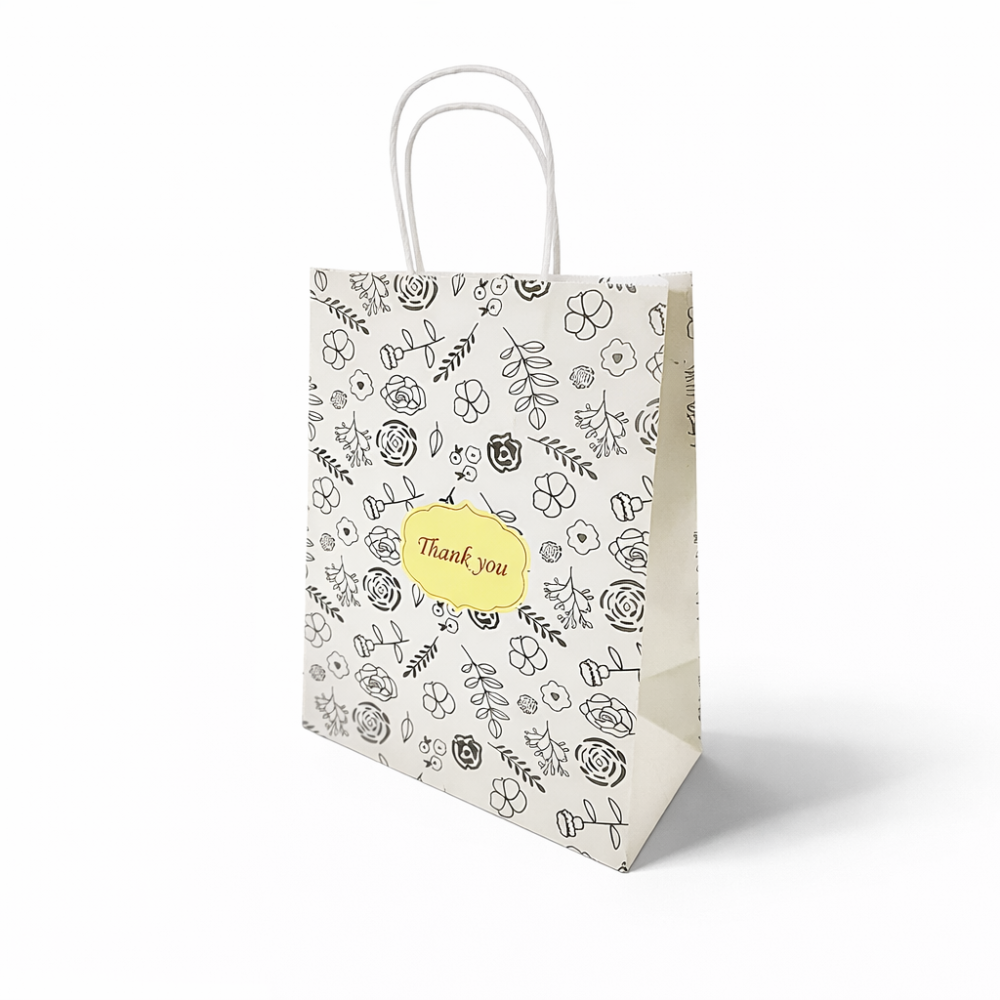 12 bolsas de papel kraft con flores negras sobre fondo crudo 21 x 11 x 27 cm