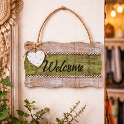 Cartel decorativo «Welcome» sobre fondo verde