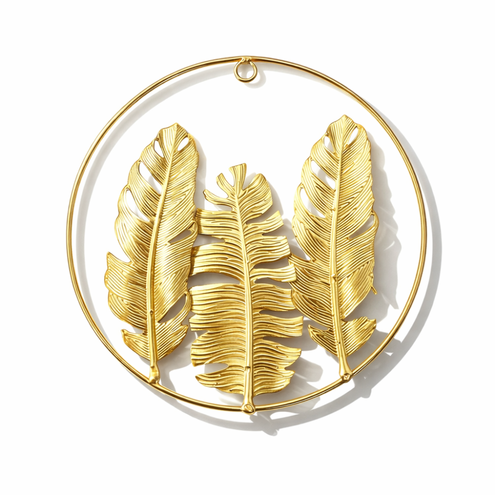 Decoración de pared circular con 3 hojas tropicales de metal dorado