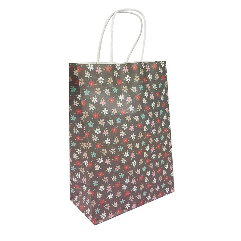12 bolsas grandes de papel kraft con motivos florales sobre fondo gris oscuro, 25,5 x 12 x 33 cm