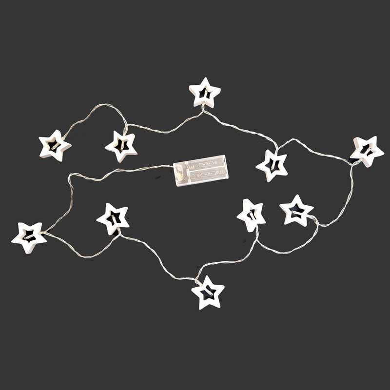 Guirlande de noël lumineuse d'étoiles blanches en bois