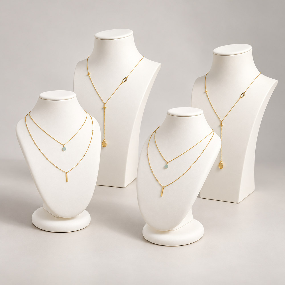 Kit vitrine 4 bustes bijoux en simili cuir blanc nacré : 40, 35, 28 et 25 cm, -50 %
