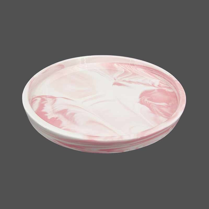 Petit plateau rond effet marbré rose clair en céramique