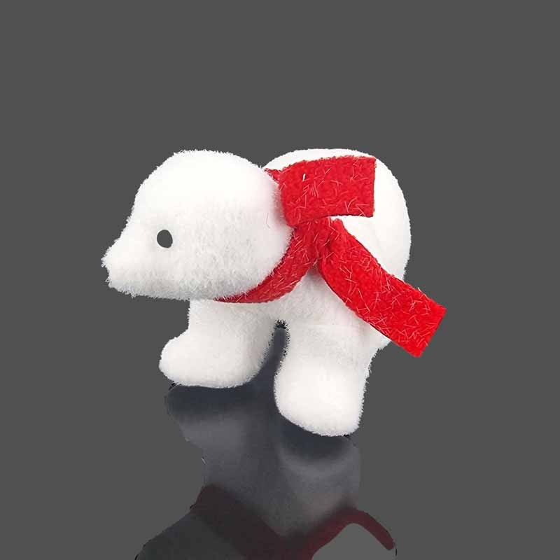 Petit ours polaire de Noël avec écharpe rouge