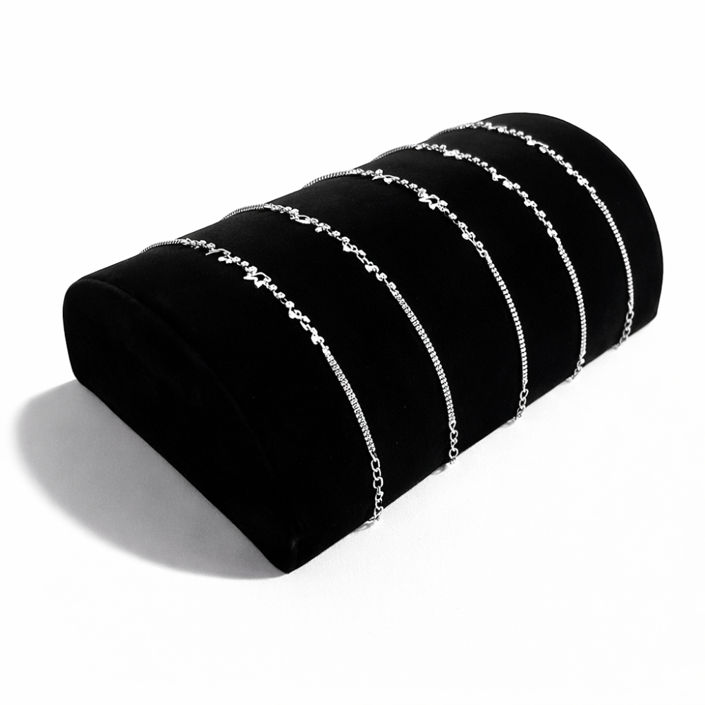 Supporto per bracciali a semicilindro in velluto nero